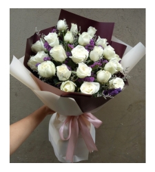 send 2 dozen of white roses in bouquet to cebu